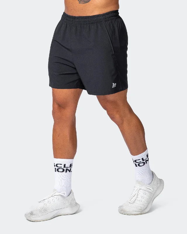 Men's wide - leg linen blend shorts for a relaxed beachside vibeMuscle Nation | New Heights 4" Shorts - Black