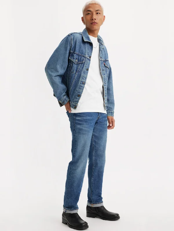 Men's Distressed Jeans with Patches for a Retro and DIY - Inspired AppearanceMen's 511 Blue Slim Fit Jeans