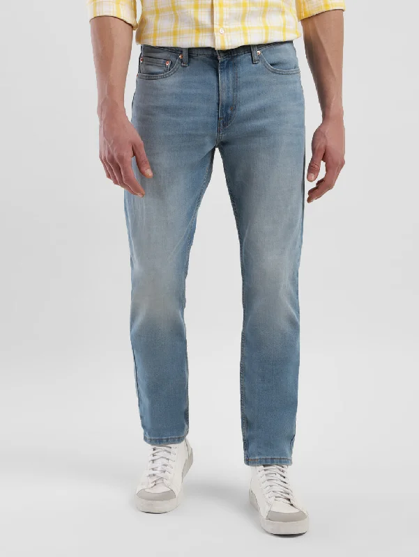 Men's Distressed Jeans with Patches for a Retro and DIY - Inspired AppearanceMen's 511 Blue Slim Fit Jeans