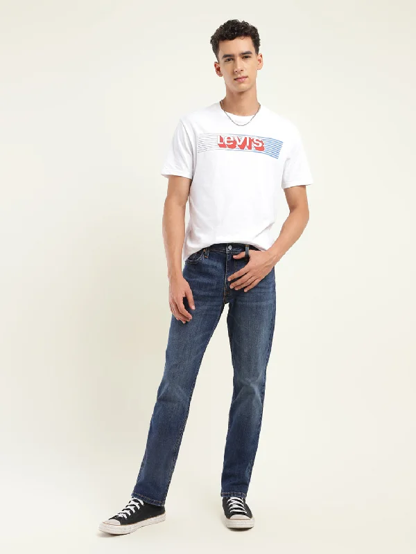 Men's Distressed Jeans with Patches for a Retro and DIY - Inspired AppearanceMen's 511 Indigo Slim Fit Jeans