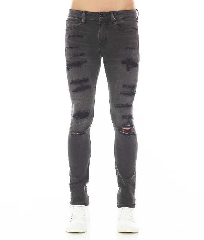 Men's Distressed Jeans with Patches for a Retro and DIY - Inspired AppearanceStrat Super Skinny Fit Jean In Phantom