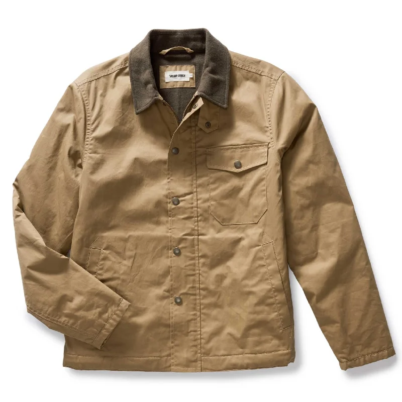 Lightweight men jackets made from recycled nylon for eco - friendly travelThe Deck Jacket in Khaki Dry Wax